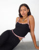 Image of Idalia Corset Top in Zwart met Roze Mesh Ruffle