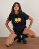Afbeelding van Saki T-shirt in zwart met opdruk Squeeze Me Orange