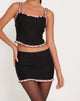 Afbeelding van Imar minirok in zwart met roze mesh ruches