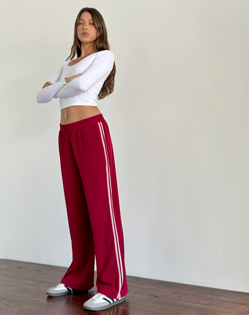 Afbeelding van Bennett broek met wijde pijpen in kleermakersrood met roze streep