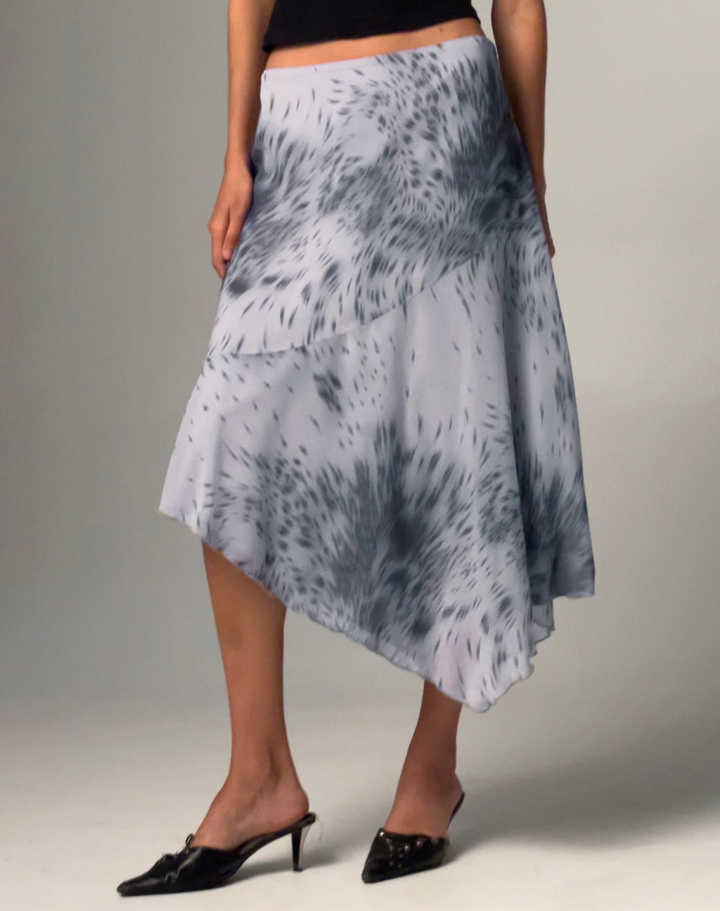 Cinta Low Rise Midi-rok in vervormde dierenprint