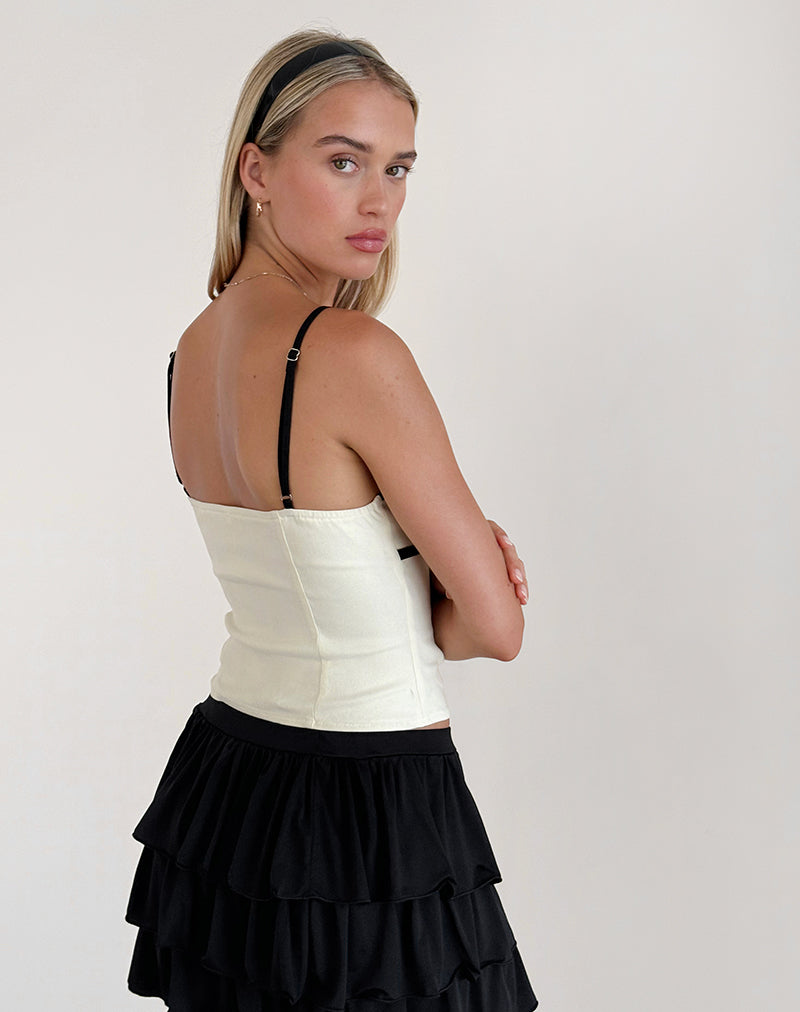 Afbeelding van Duta Cami Top in crème met zwarte strikken