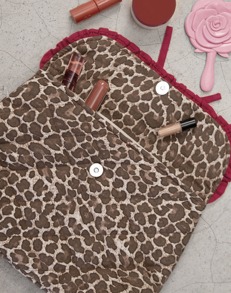 Afbeelding van Fold Over Make-up tas in luipaard met rode franje strik