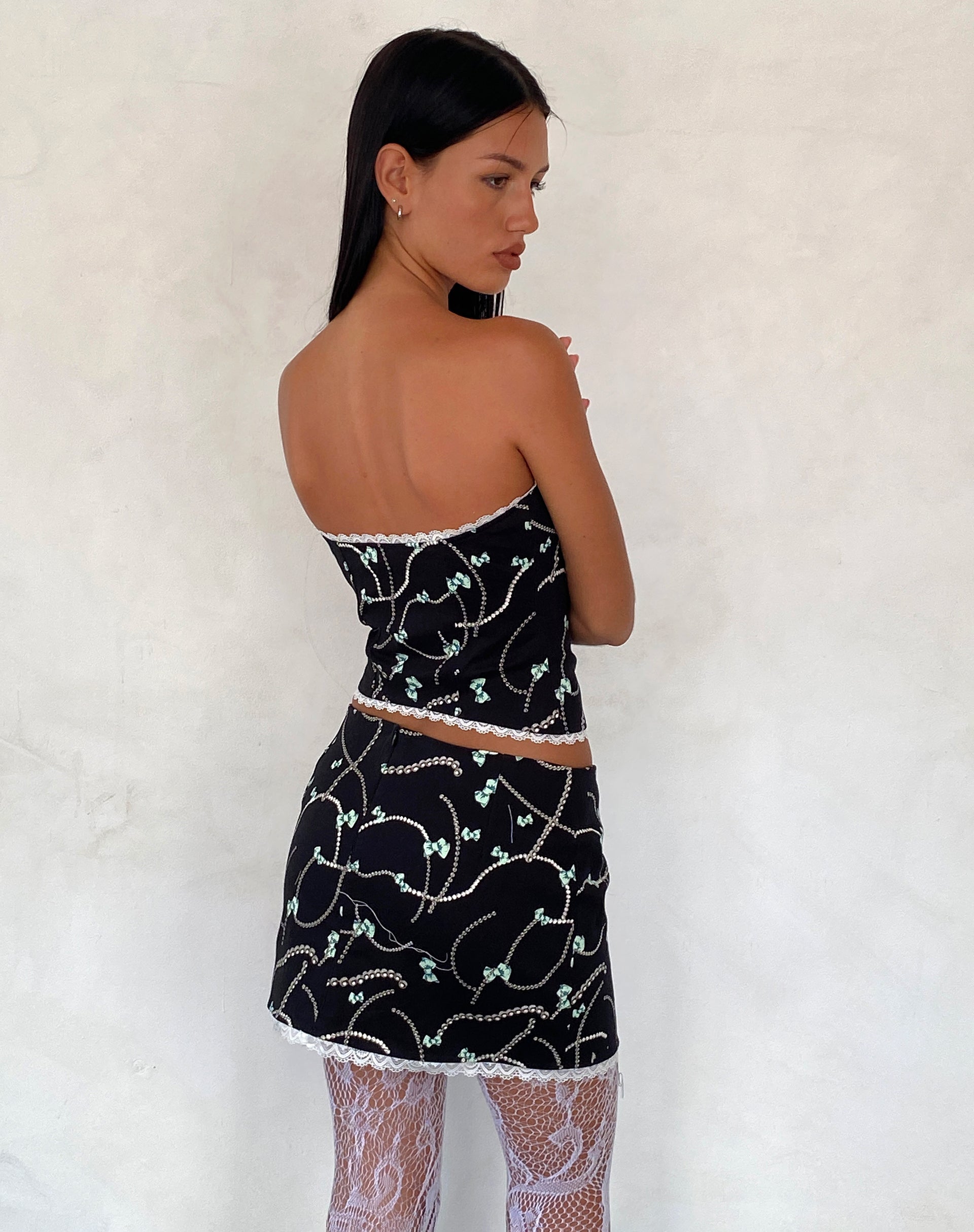 Afbeelding van Lacur Bandeau Korset in Zwart met Parel en Strikprint