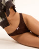 Afbeelding van Adrienne String in Jersey Chocolade met Roze Strik