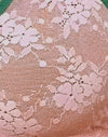 Roze mesh met groene contrastbinding