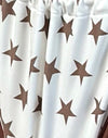 Witte en bruine sterrenprint met contrastbinding