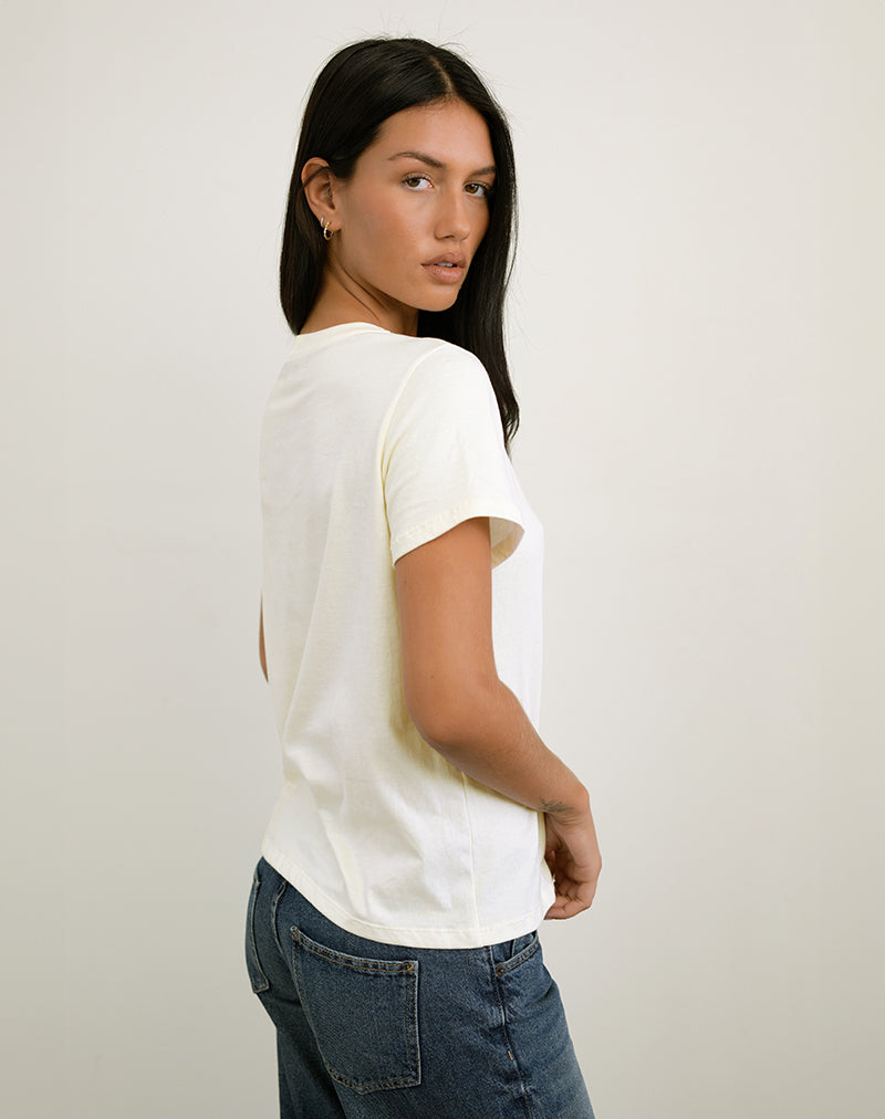 Afbeelding van Saki T-shirt in Ivoor met Upper East Sider print