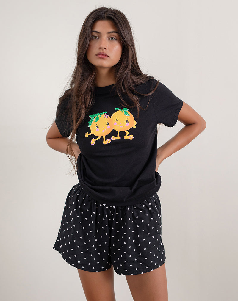 Afbeelding van Saki T-shirt in zwart met opdruk Squeeze Me Orange