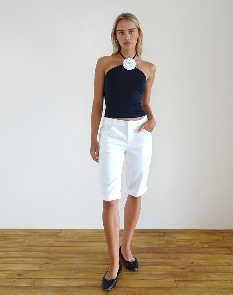 Afbeelding van Tarrina Haltertop in donkerblauw met wit rozet
