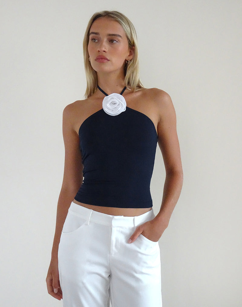Tarrina Haltertop in donkerblauw met wit rozet
