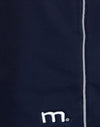 Navy met witte biezen met M embleem