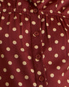 Verbrand rood met polkadruk
