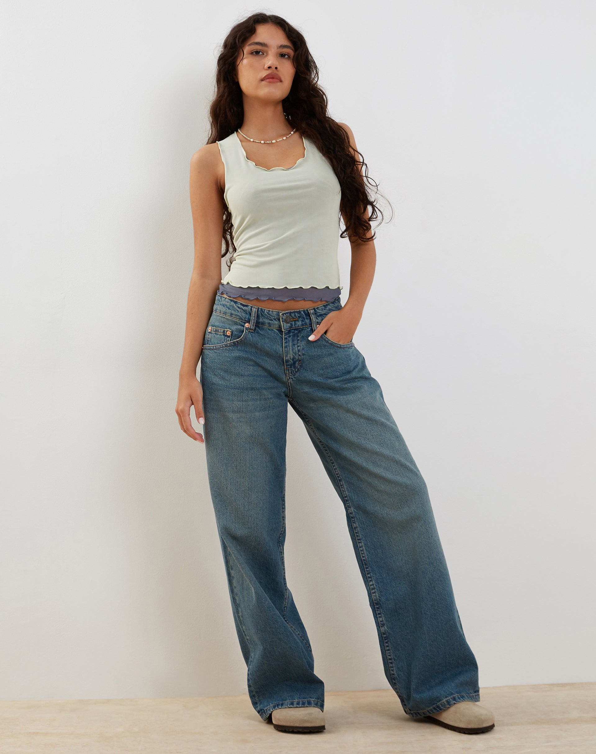 Afbeelding van Zeta Vest Top in Geel met Navy Voering