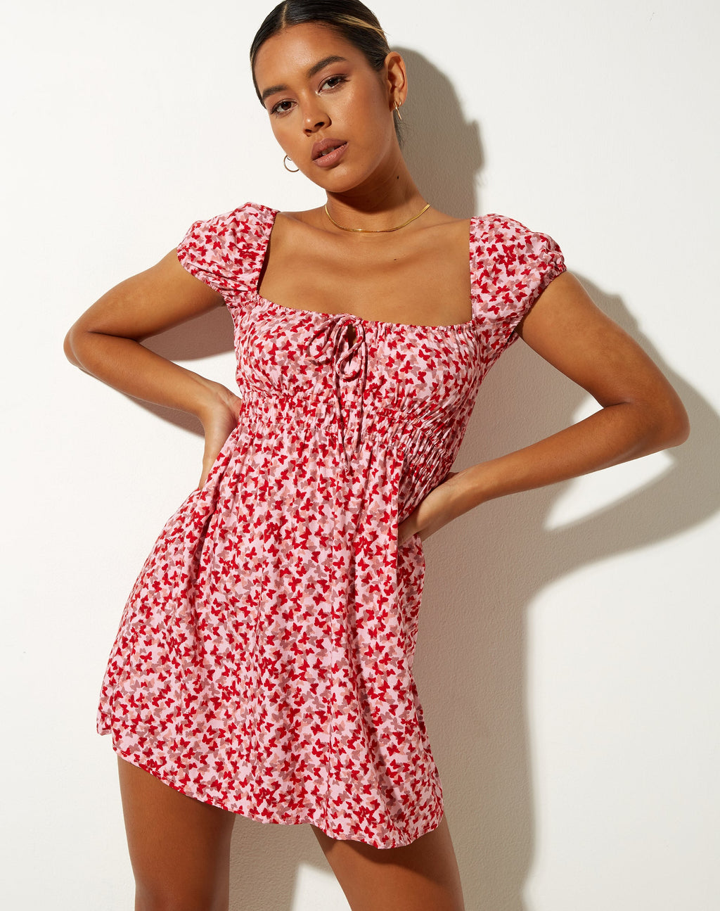 Galova Mini Dress in Ditsy Butterfly Peach en Red