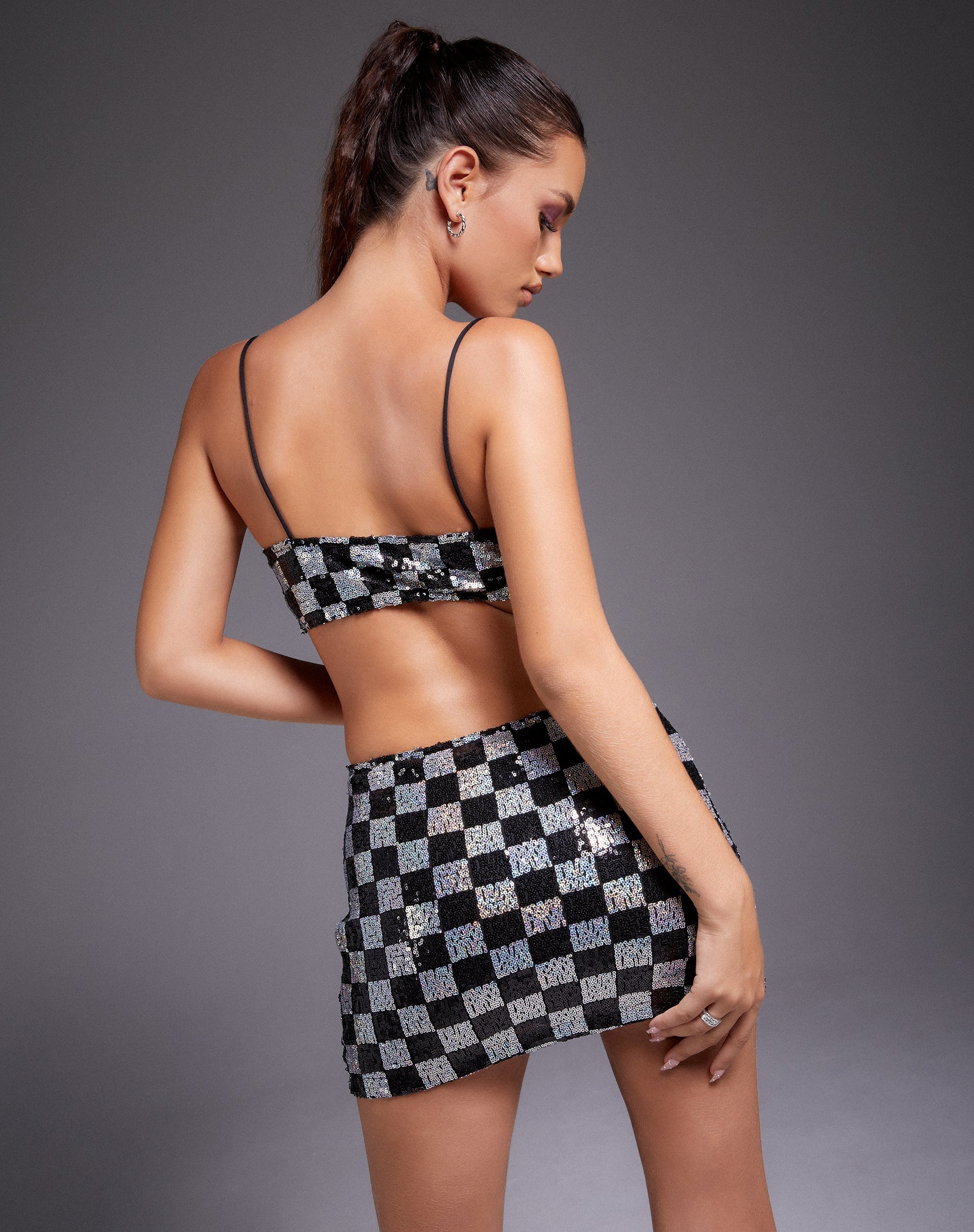 Afbeelding van Keyan Tube Top in Checkerboard Sequin Zwart en Zilver