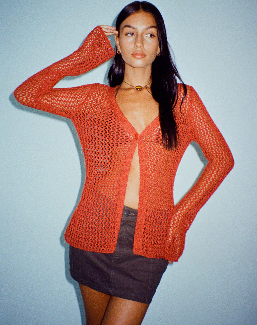 Sukati Cardi in gebrand oranje