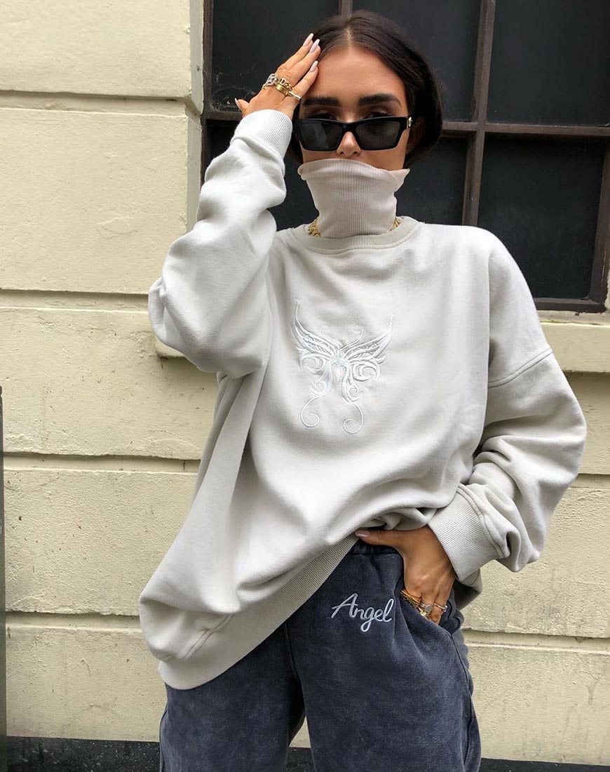 Glo Sweatshirt in Ecru met Vlinder Embro